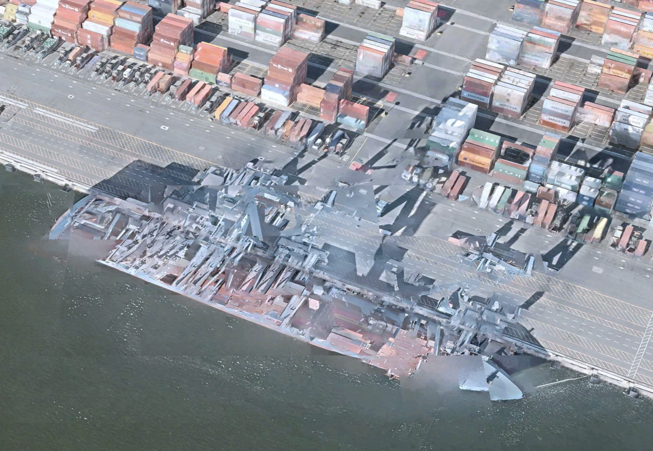 Containership fragmented by ghostly cargo cranes and their shadows.