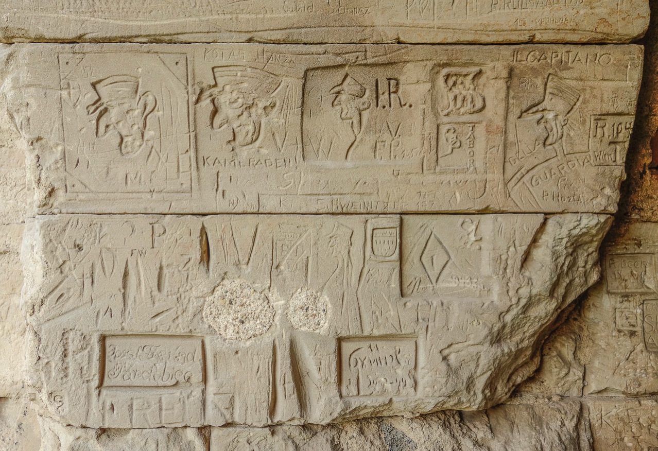 Carvings in upper portion of the north wall of moat tunnel at Terezin