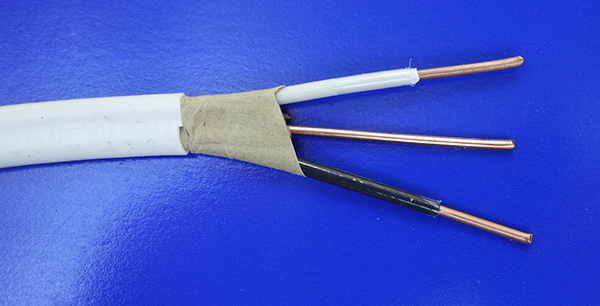 stripped end of 14/2 Romex cable: two insulated 14-gauge conductors with bare ground wire