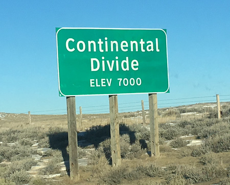 sign at the continental divide, elevation 7000
