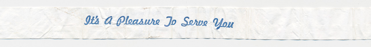 Drinking-straw wrapper inscribed “It’s A Pleasure To Serve You”